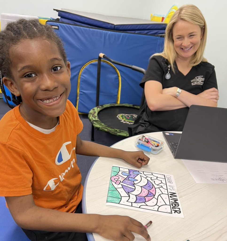 Callie Hegland Occupational Therapist with pediatric client